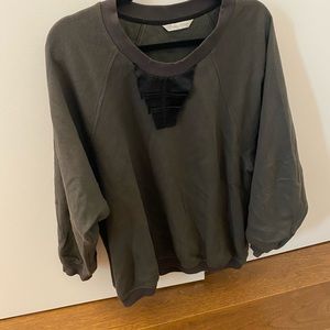 Silk embellishes swearshirt